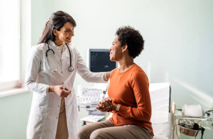 A dermatologist in consultation with a patient